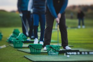 Practicing at driving range